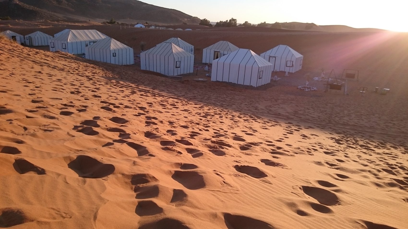 Desert camp at sunset in Merzouga